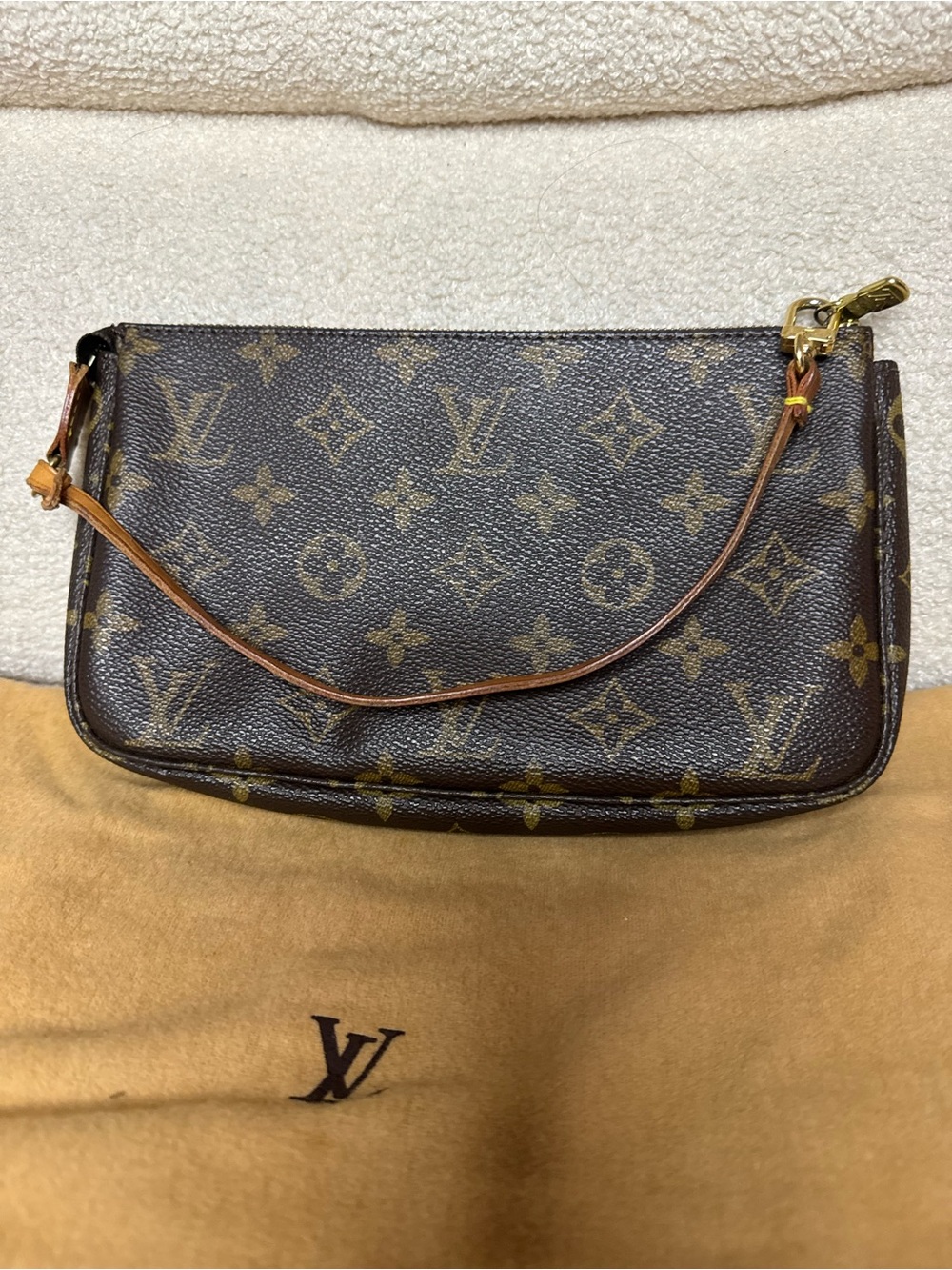 Louis Vuitton Monogram Canvas Wristlet in Brown and Gold-Tone Hardware